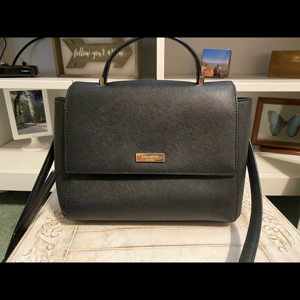 Black Kate spade crossbody strap purse.